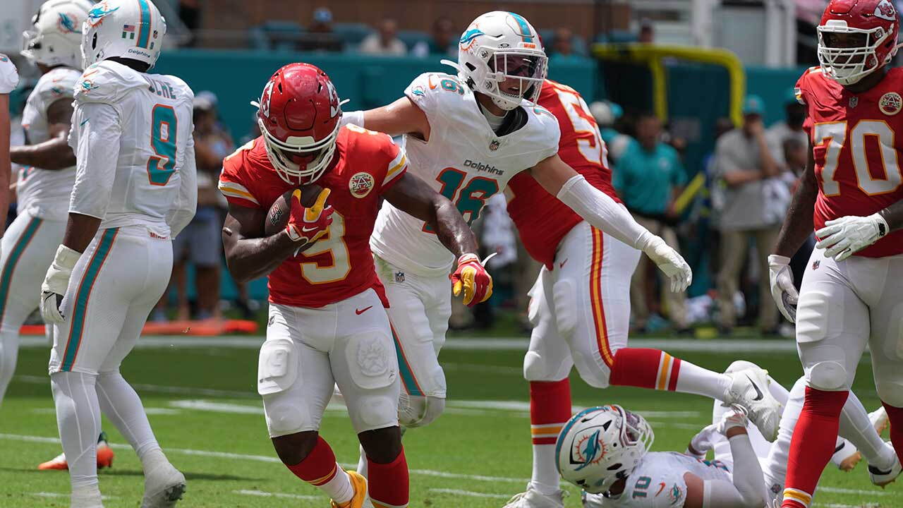 Kansas City Chiefs running back Kenneth Walker III scores a touchdown during an NFL football game against the Miami Dolphins, Sunday, Sept. 27, 2026, in Miami Gardens. 
