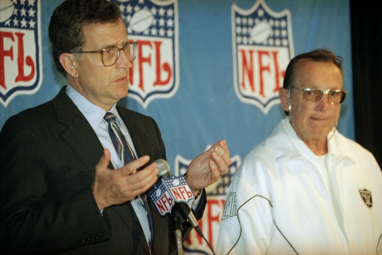 NFL Commissioner Paul Taglibue and Los Angeles Raiders owner Al Davis discuss team's return to Oakland, July 21, 1995