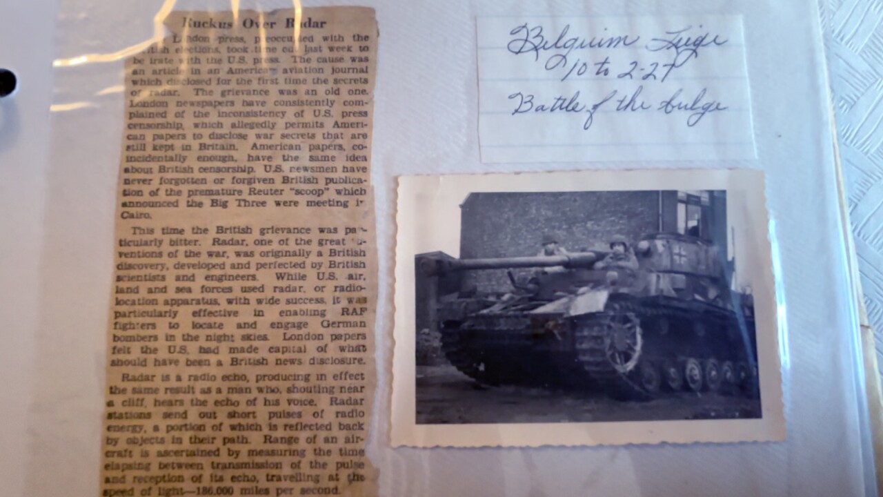 CLARENCES PHOTOBOOK.jpg