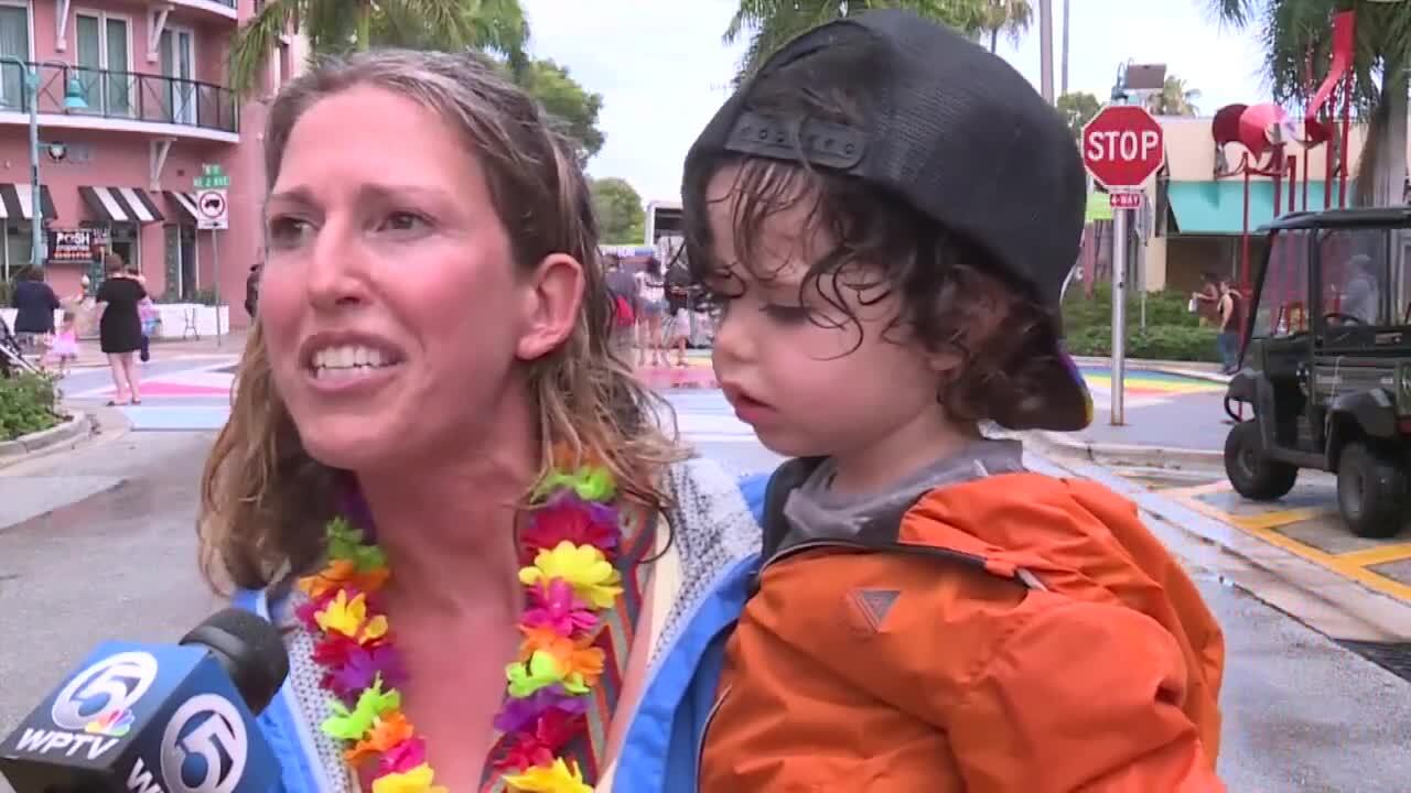 Dahlia Nayman and her 3-year-old son attend Delray Beach Pride event, June 11, 2022
