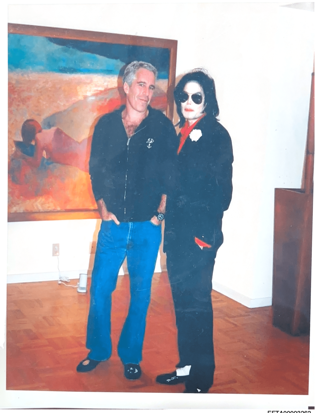 Jeffrey Epstein and what appears to be Michael Jackson
