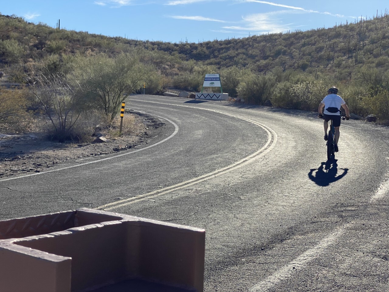 Bike rider climbs "A" Mountain in Sentinel Peak Park