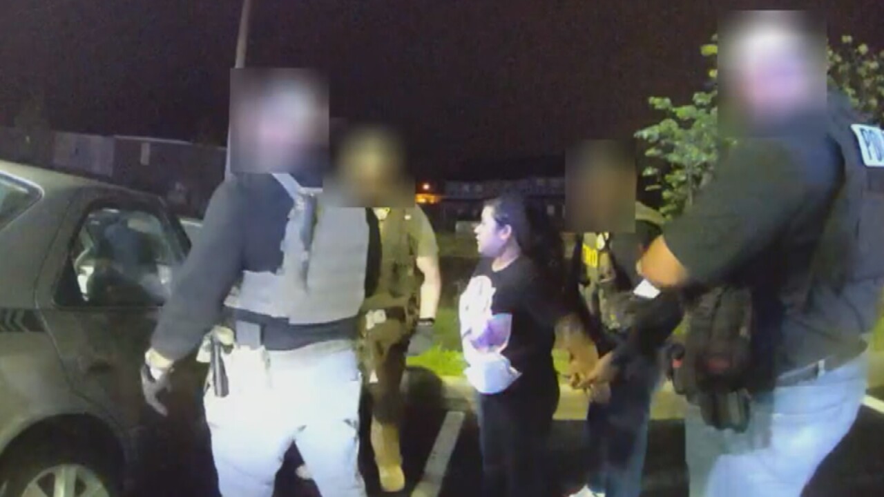 woman handcuffed.jpg