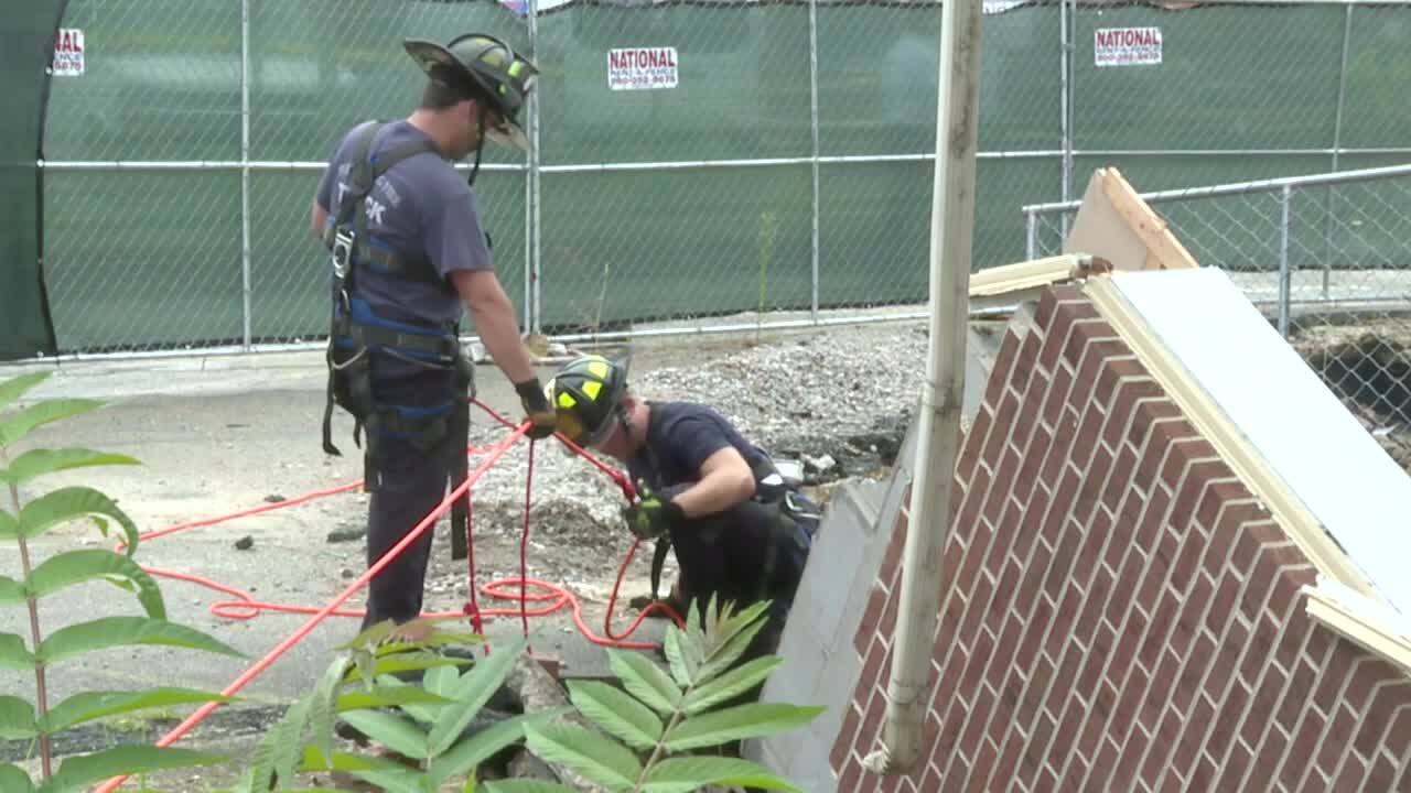 Deluge in centuries-old stormwater tunnel causes Old Towne Petersburg building to partially collapse