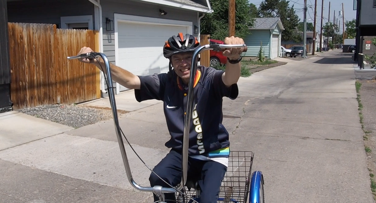 gil rides his bike.png