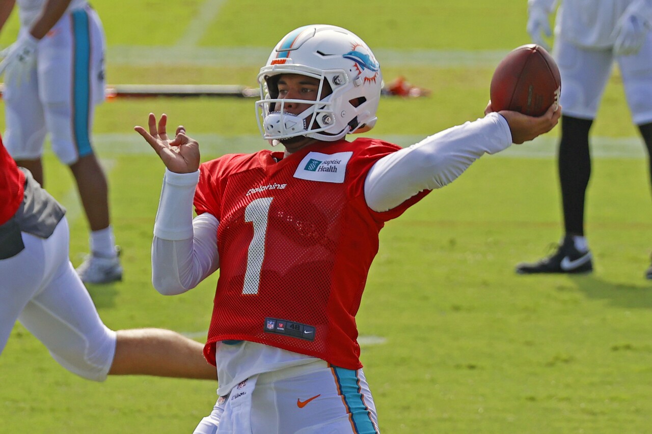 Miami Dolphins QB Tua Tagovailoa throws football during training camp, Aug. 17, 2020