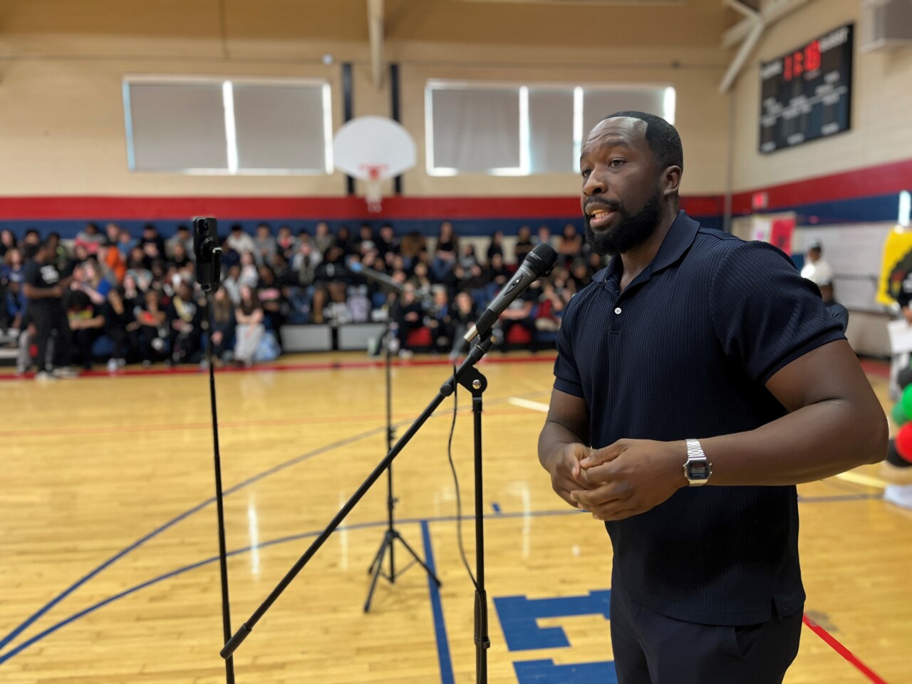 Levi Ismail offers words of encouragement to students of Isaac Litton Middle School