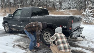 Colorado drivers struggle with chaining up along I-70 during winter storms, despite a new law meant to help.jpeg