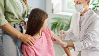Child,Receives,Vaccination,Injection,From,Doctor.,A,Nurse,Uses,A