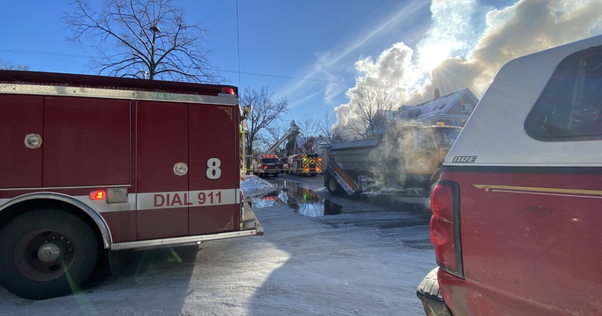 Firefighters battling massive house fire in Grand Rapids