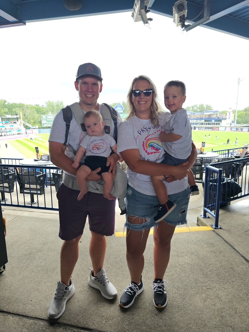 payton family with shirts.jpeg