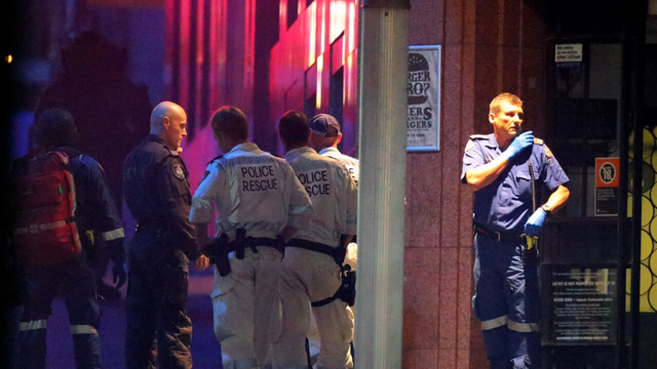 PICS: Standoff at Sydney cafe