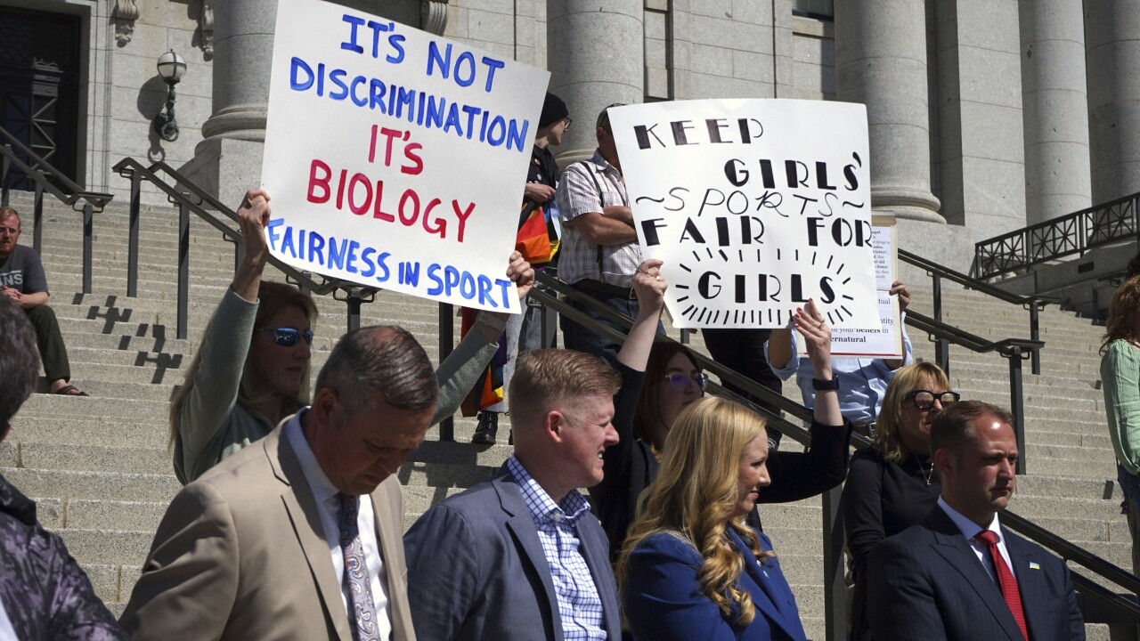 Lawmakers listen as parents speak about the prospect of their children competing against transgender girls