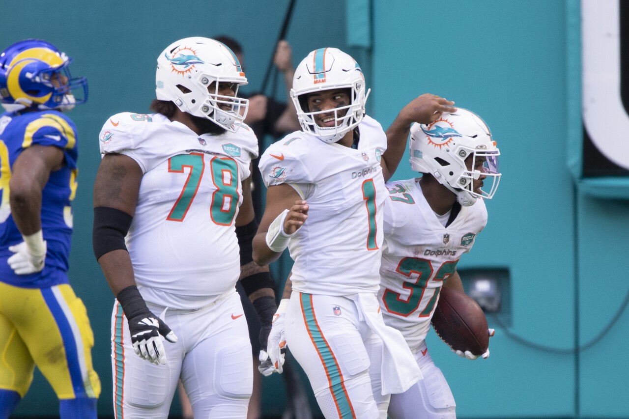 Miami Dolphins QB Tua Tagovailoa celebrates with offensive tackle Adam Pankey after running back Myles Gaskin scores TD vs. Los Angeles Rams, Nov. 1, 2020
