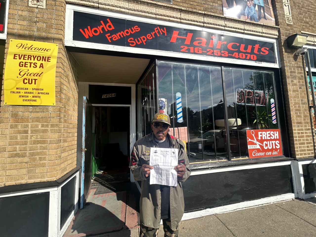 Art McKoy With Letter Demanding Repairs to Euclid Avenue