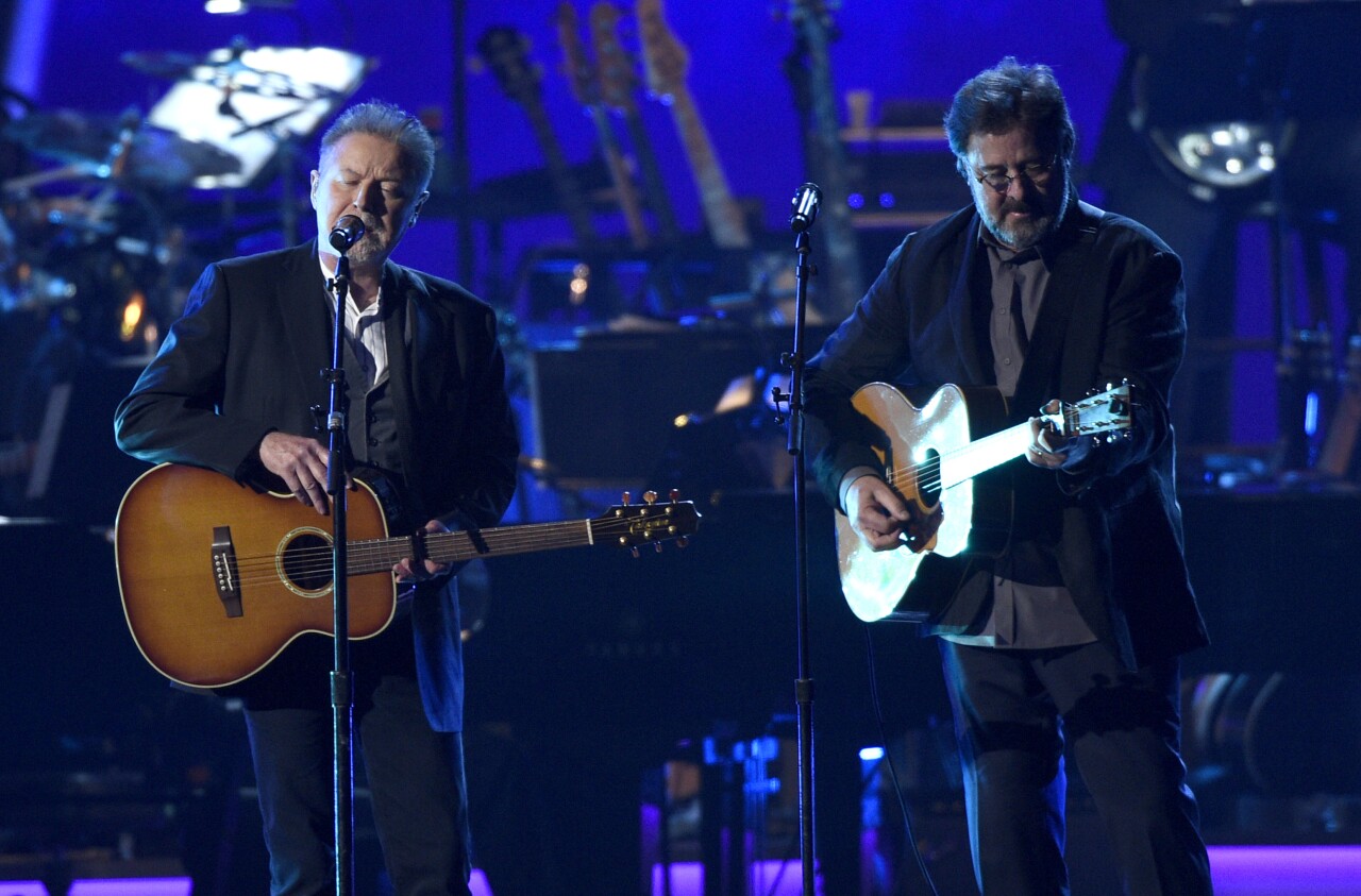 Glenn Frey and Vince Gill of Eagles perform in 2019
