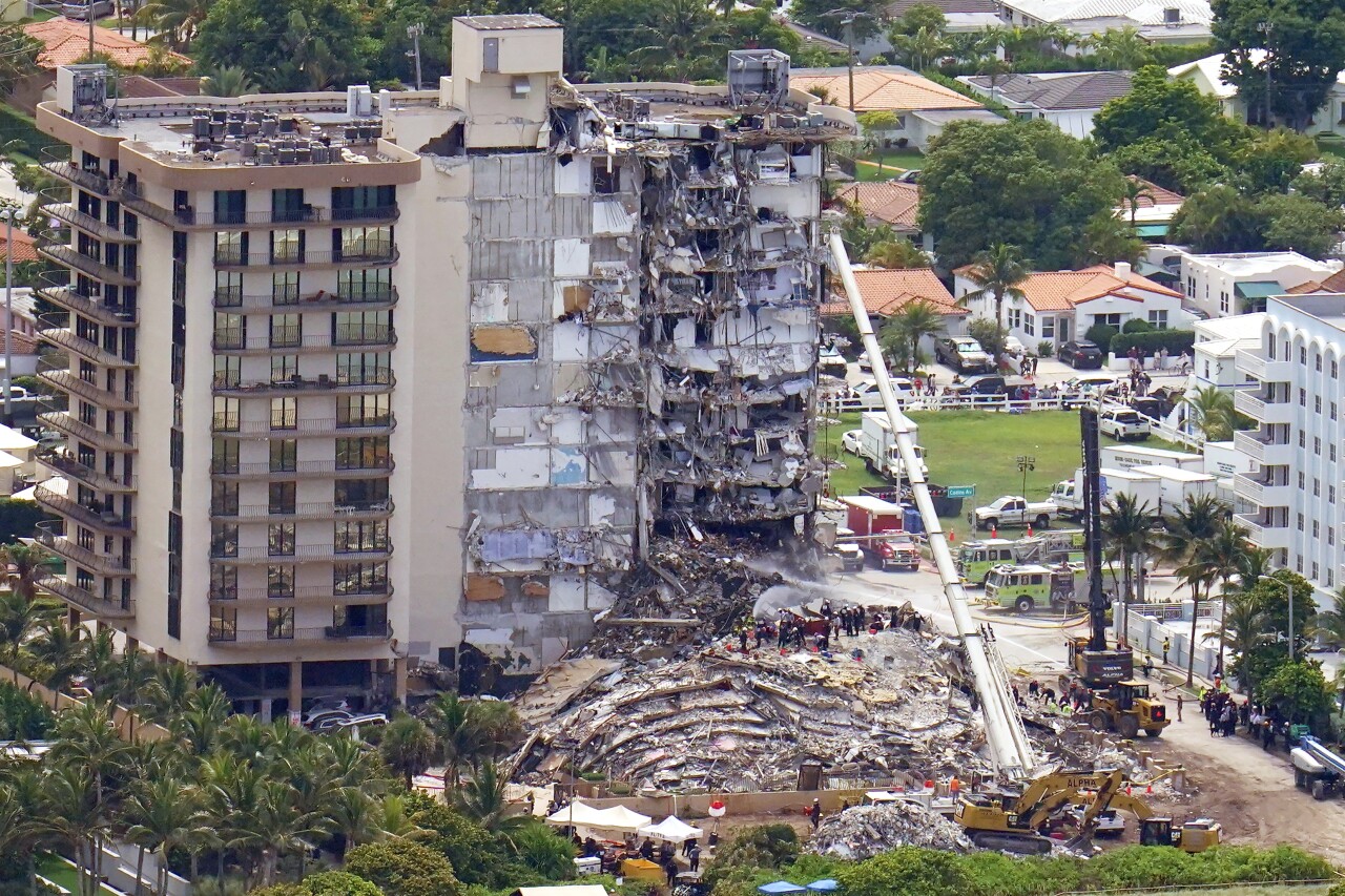 Aerial view of workers searching rubble at Champlain Towers South after condo collapse, June 26, 2021