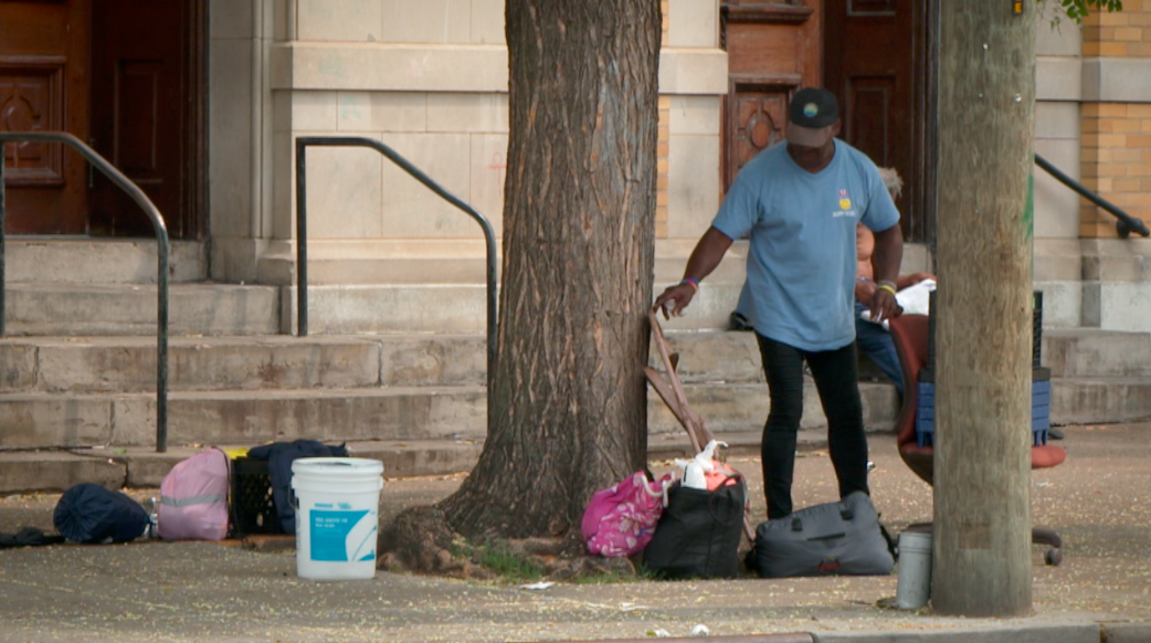 Crowds regularly gather outside St. Francis Seraph Church in Over-the-Rhine, where leaders may fence off steps and put up surveillance cameras