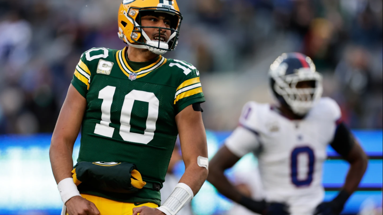 Green Bay Packers' Jordan Love reacts to a touchdown pass during the second half of an NFL football game against the New York Giants Sunday, Nov. 16, 2025, in East Rutherford, N.J.