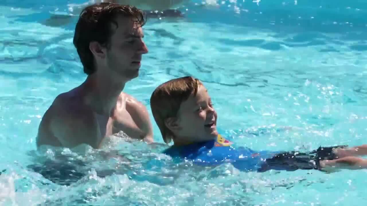 Brower helping at the pool