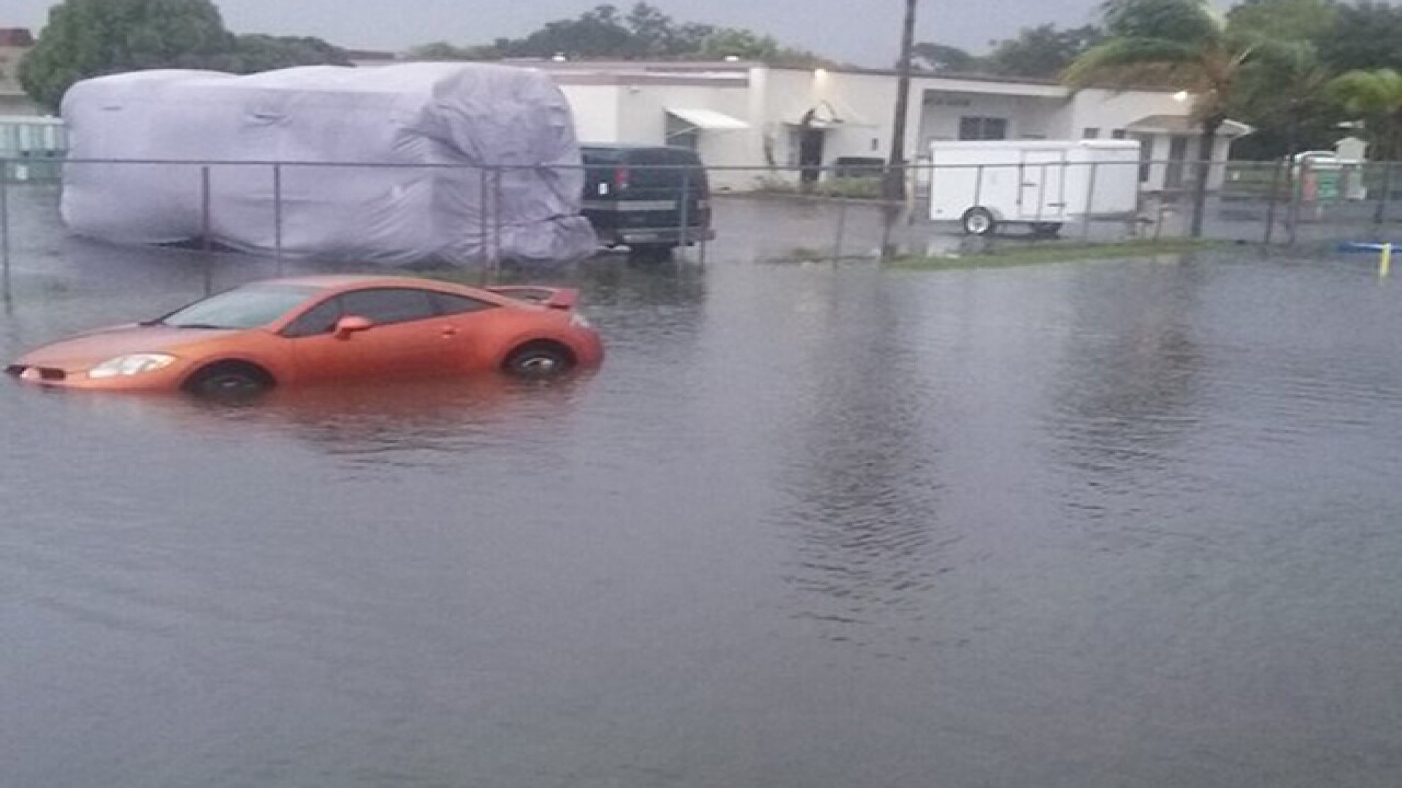 PHOTOS | Tropical system causing flooding