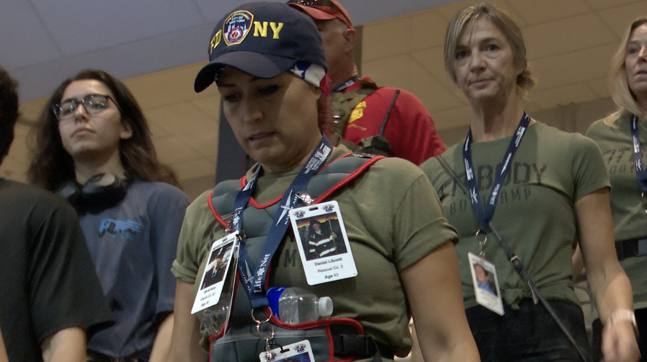 Pictures of fallen first responders and military personnel on every lanyard of a participant