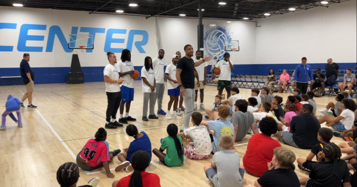 Former UK athletes train local kids at free Champions Basketball Camp