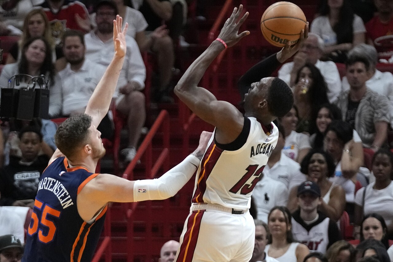 Miami Heat center Bam Adebayo goes up for shot against New York Knicks center Isaiah Hartenstein during first half of Game 6 of NBA second-round playoff series, May 12, 2023