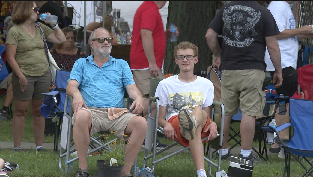 Father and Son enjoying parade