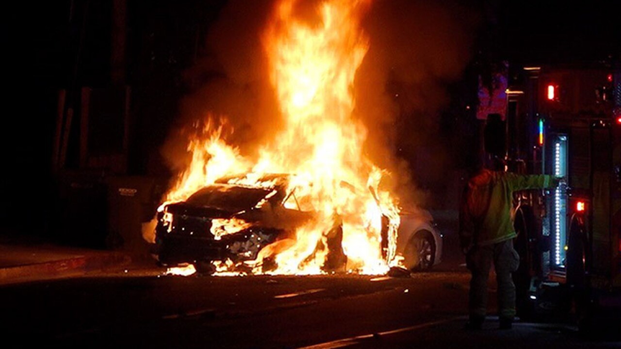 Car crashes, bursts into flames on National City street