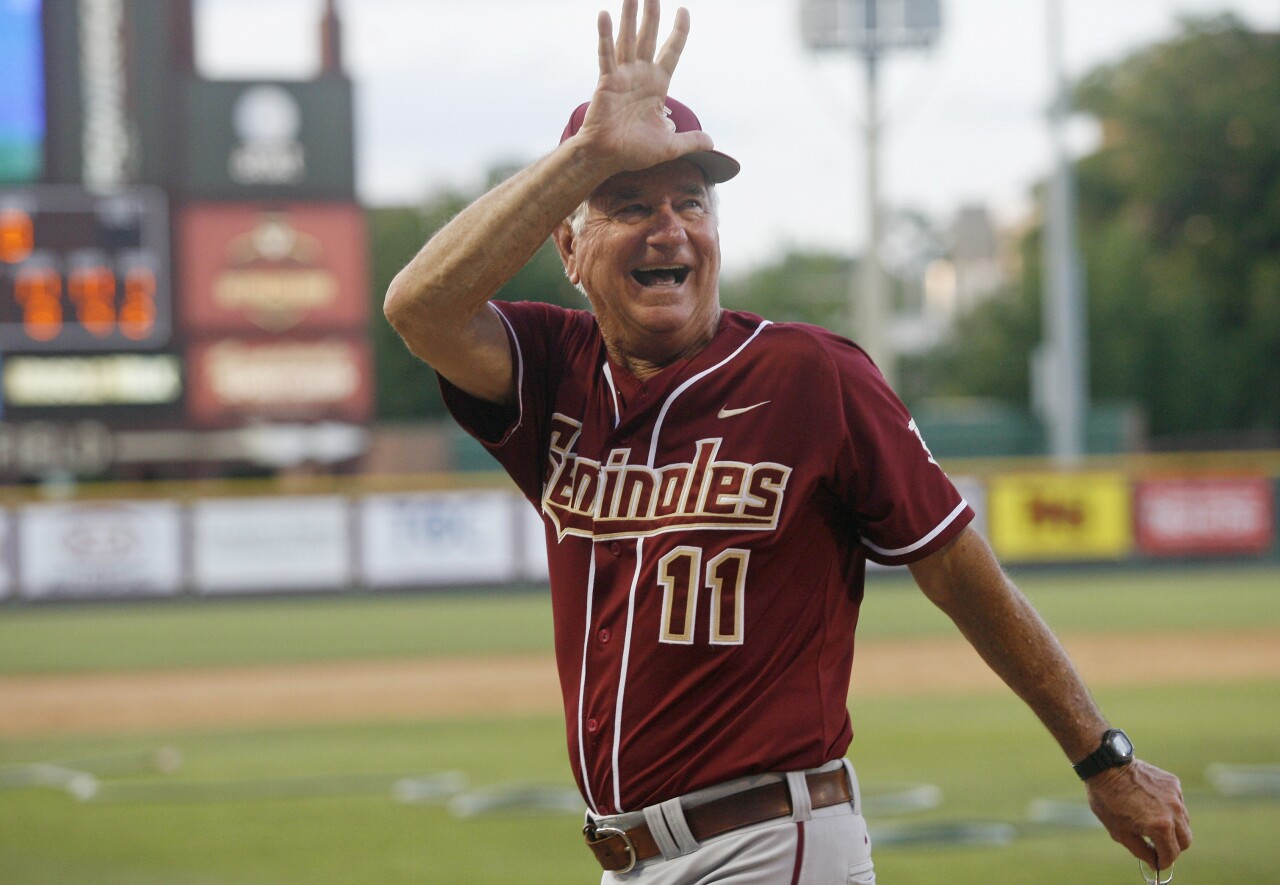 Florida State Seminoles baseball coach Mike Martin waves to fans in 2013