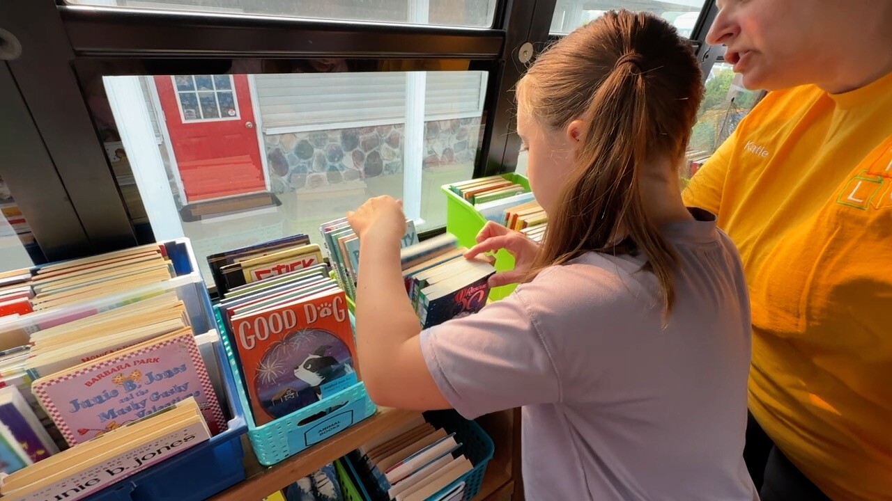 Quinn looking at books.jpg