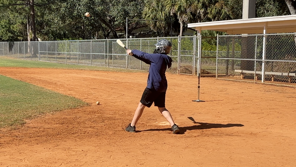 A kid batting