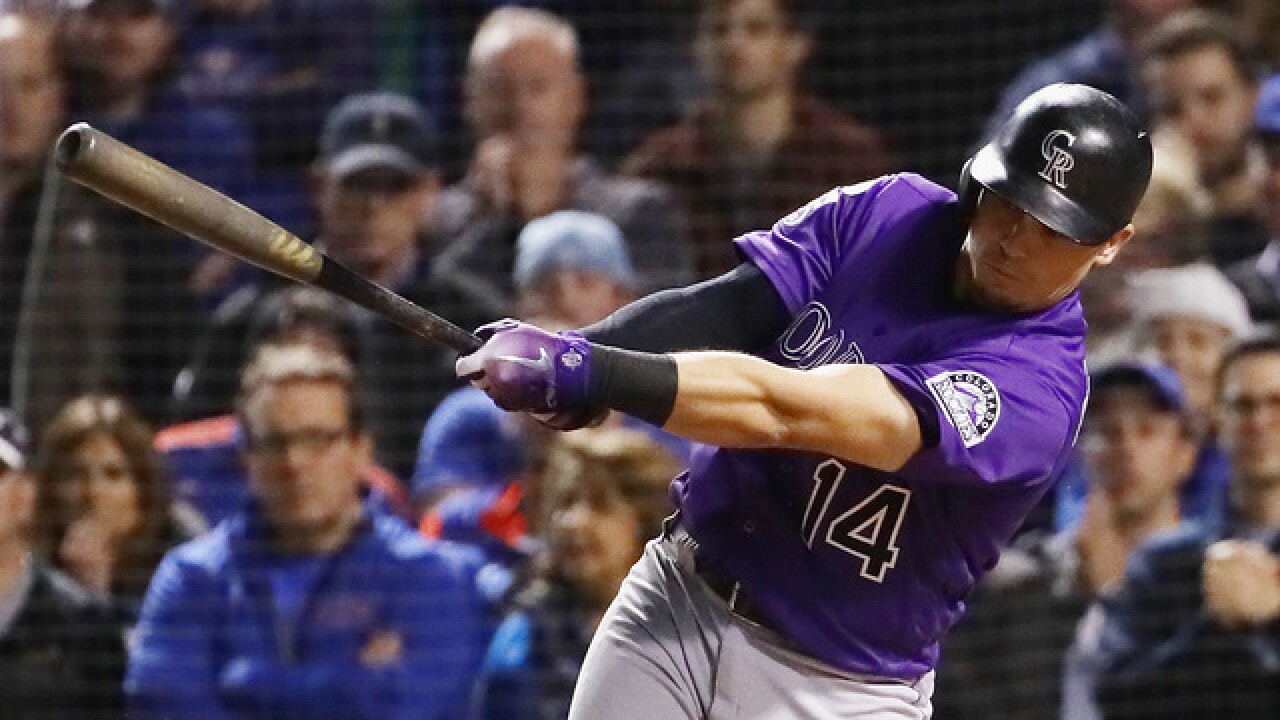 Rockies top Cubs 2-1 in 13 innings in epic wild-card game