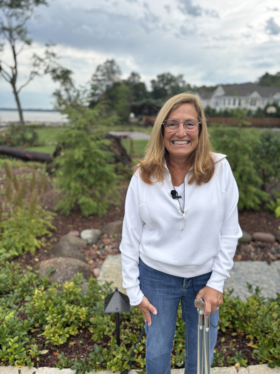 Sally Kadrich had several trees uprooted in her yard Friday morning