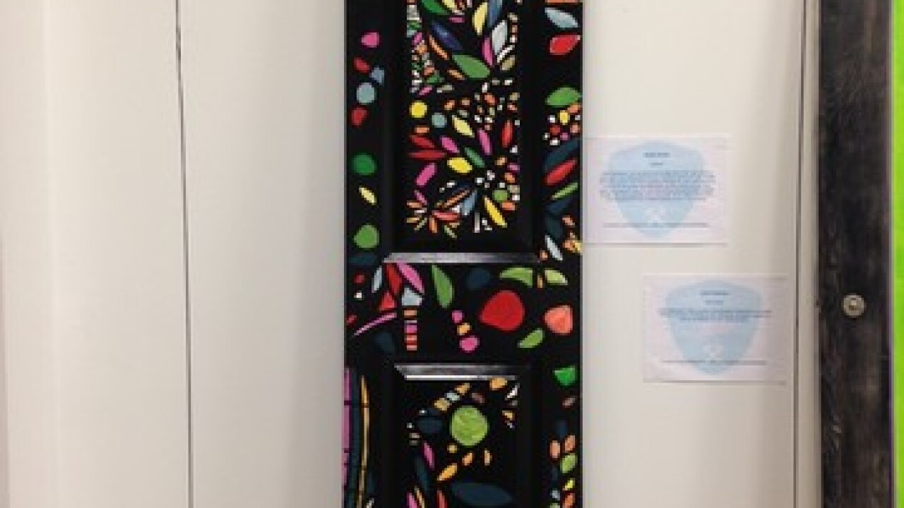 GALLERY: Artists design doors for a good cause