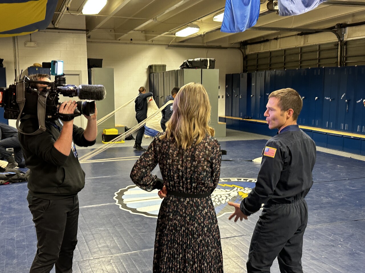 News5's Dianne Derby interviewing Wings of Blue Coach Air Force Lt. Col Jarrod Aranda