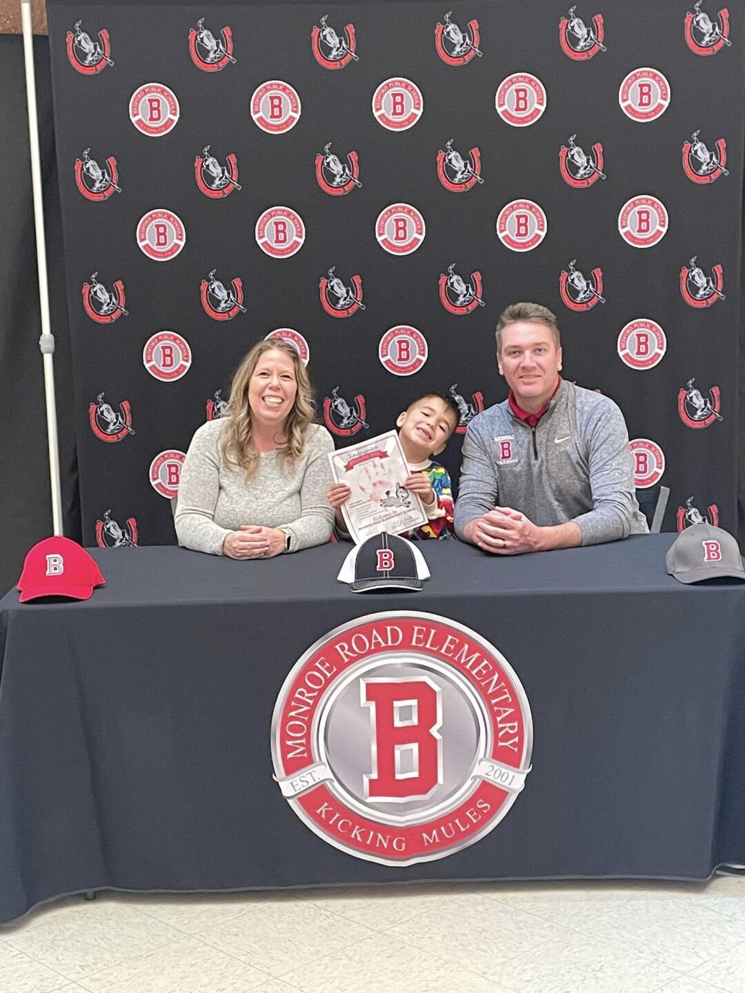 MONROE ROAD SIGNING DAY 1