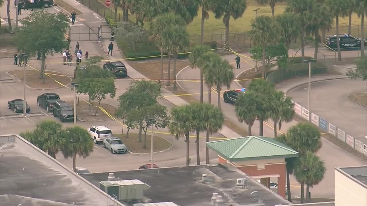 Police tape in parking lot of Suncoast Community High School, April 22, 2024