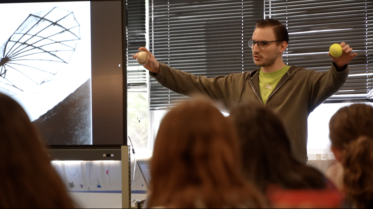 Instructor from AirZoo in Kalamazoo taking about gravity and how it applies to aviation