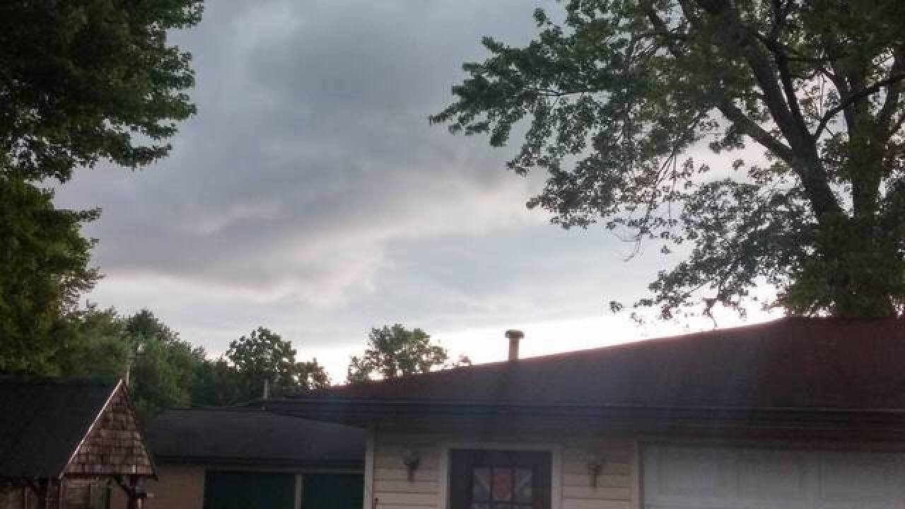 PHOTOS: Ominous skies and storm damage