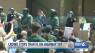 Officers kneel with protesters in SLO; crowd blocks Hwy 101