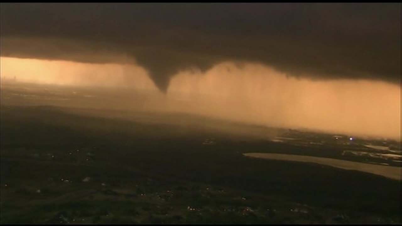 PHOTOS: Tornado forms, touches down