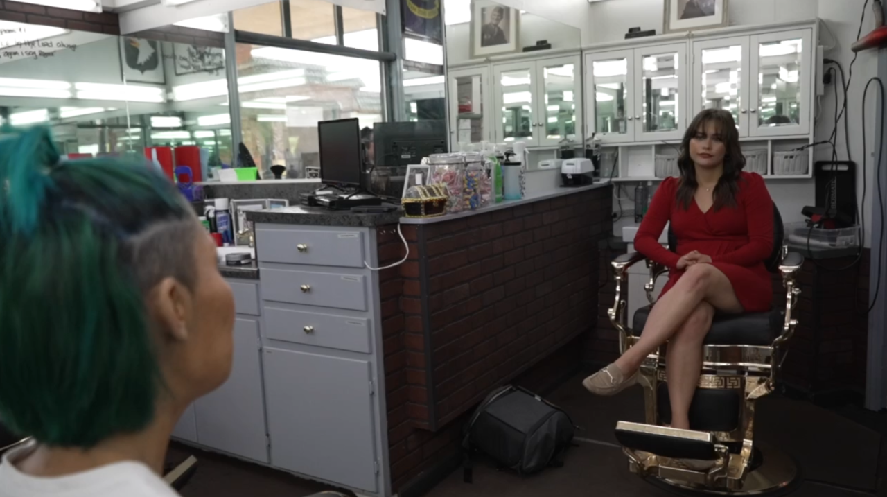 Bakersfield Neighborhood News Reporter Veronica Morley interviewing Theresa Ochoa, who has been cutting hair for 22 years