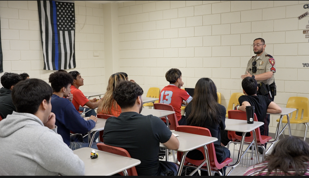 Sergeant Joey Gonzalez answers questions for students
