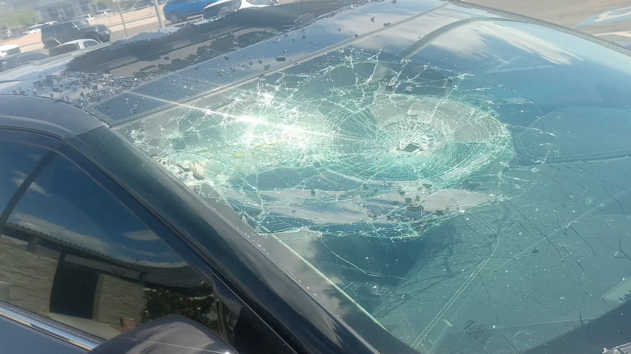 Las Vegas mother struggles after inflatable display damages car during windstorm