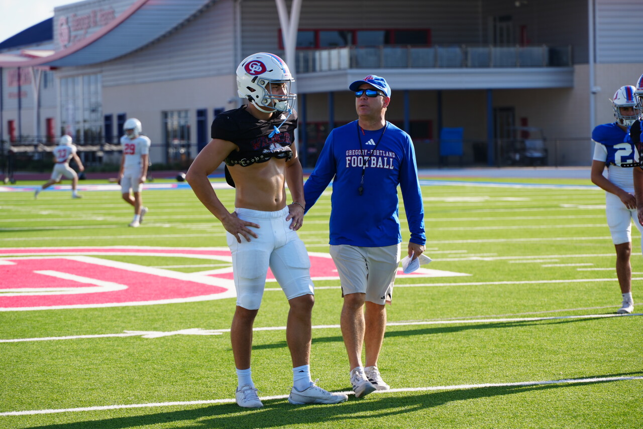 Gregory-Portland senior safety Eli Supnet with Defensive Coordinator Mark Chester