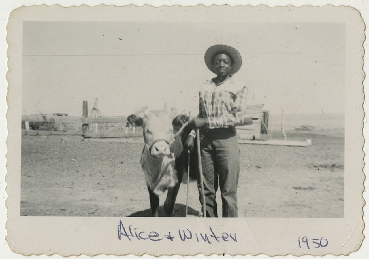 Alice McDonald and her award winning cow Winter, 1950