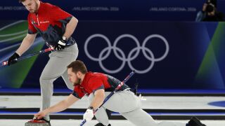 A look at the curling standings after Saturday's play in Cortina