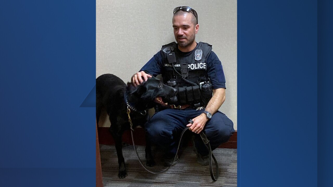 KCPD officer James Jim Muhlbauer and Champ.jpg